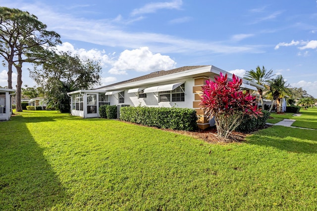 exterior space with a yard