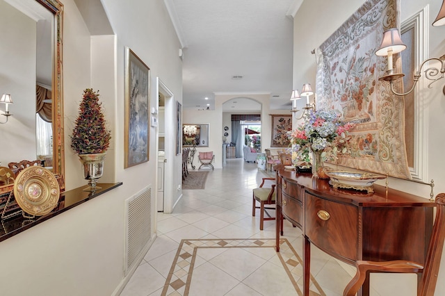 hallway featuring light tile patterned floors