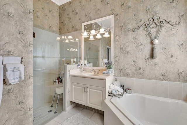 bathroom with tile patterned flooring, vanity, and separate shower and tub