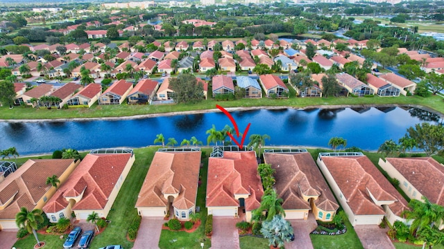 drone / aerial view with a water view