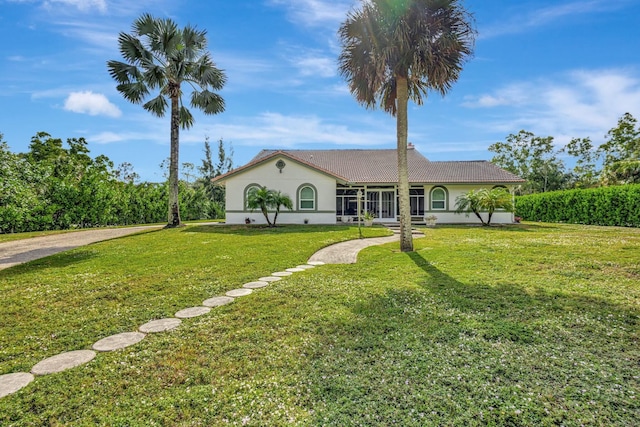 view of front of home with a front lawn