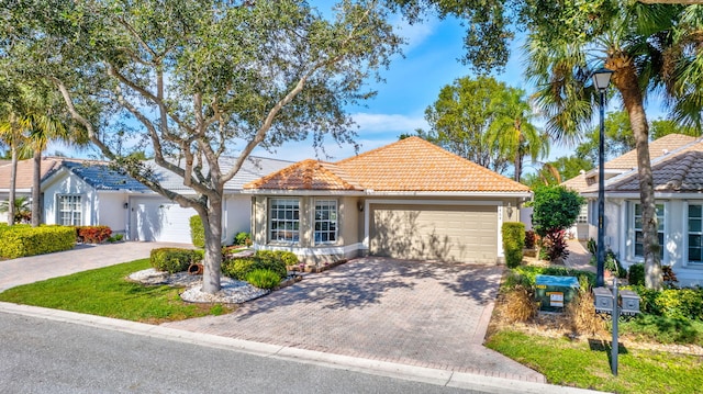 view of front of house with a garage