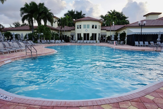 view of pool featuring a patio area