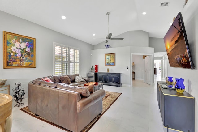 living room featuring ceiling fan and lofted ceiling