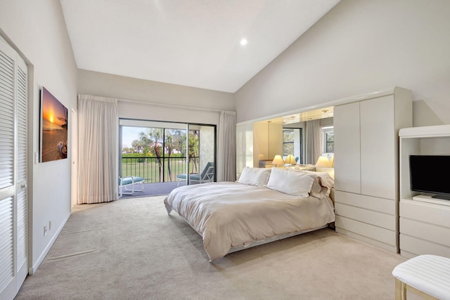 carpeted bedroom featuring high vaulted ceiling, access to outside, and a closet