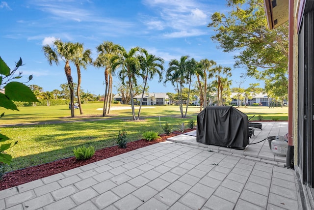 view of patio with a grill