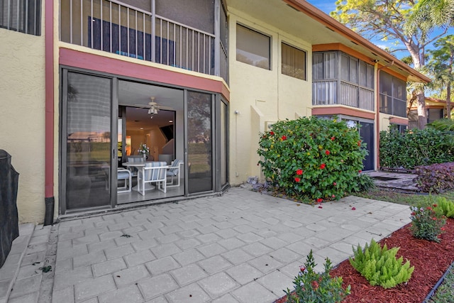 doorway to property featuring a patio area