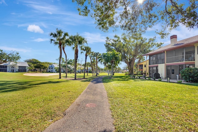 view of home's community featuring a yard