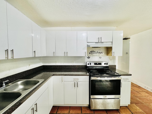 4952 Pimlico Ct, West Palm Beach, FL 33415 - kitchen with stainless steel range with electric stovetop, under cabinet range hood, white cabinets, dark countertops, and a textured ceiling