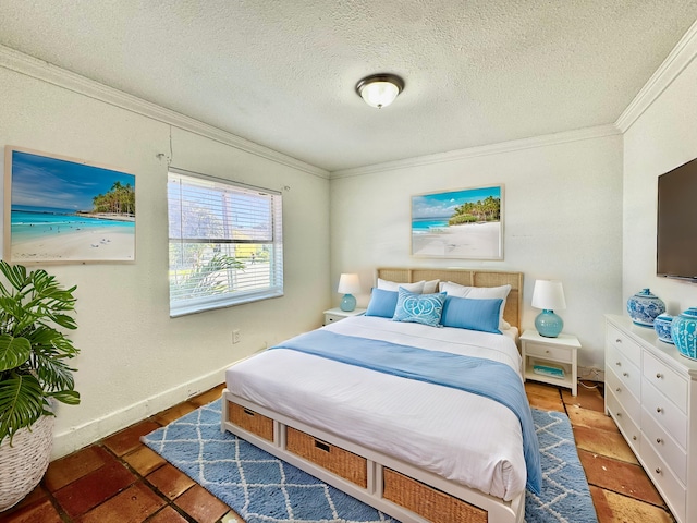 bedroom featuring baseboards, ornamental molding, and a textured ceiling