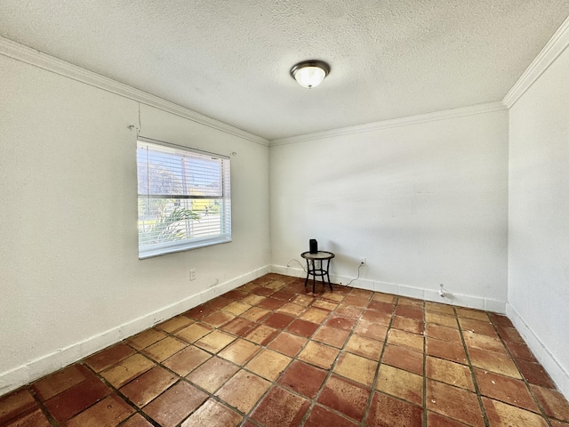 tiled empty room with crown molding, a textured ceiling, and baseboards