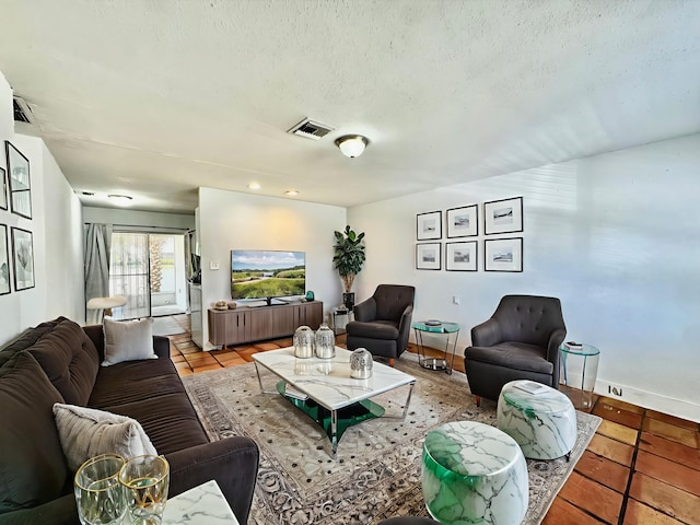 4952 Pimlico Ct, West Palm Beach, FL 33415 - living area featuring a textured ceiling and baseboards