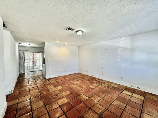 4952 Pimlico Ct, West Palm Beach, FL 33415 - tiled spare room featuring a textured ceiling and baseboards