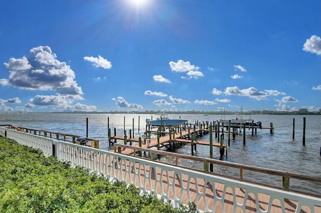 2505 S Ocean Blvd Unit 402, Palm Beach, FL 33480 - dock area featuring boat lift and a water view
