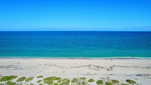 property view of water featuring a view of the beach