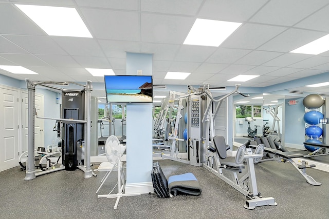 2505 S Ocean Blvd Unit 402, Palm Beach, FL 33480 - gym with baseboards and a paneled ceiling