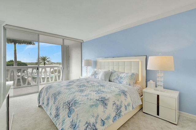 2505 S Ocean Blvd Unit 402, Palm Beach, FL 33480 - carpeted bedroom featuring access to outside and baseboards