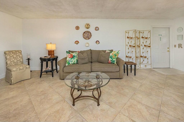 living room featuring a textured ceiling