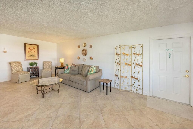 living room with a textured ceiling