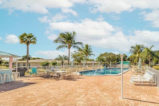 view of swimming pool featuring a patio