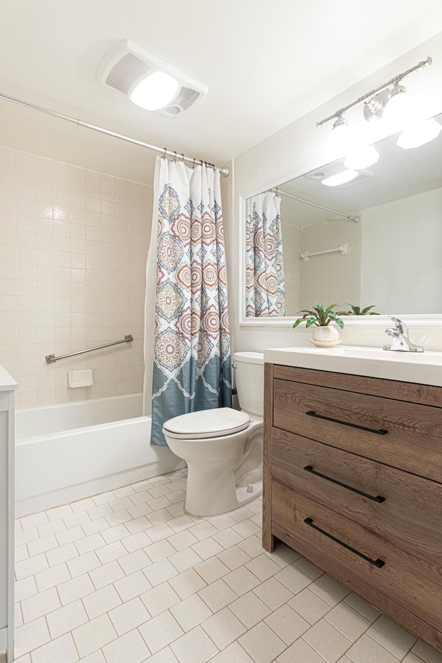 bathroom featuring shower / bath combination with curtain, visible vents, toilet, vanity, and tile patterned flooring