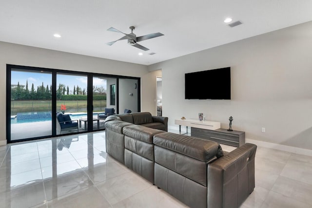 living room featuring ceiling fan