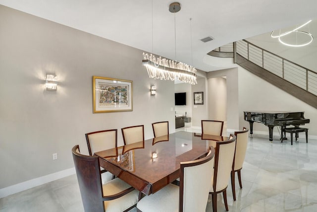 dining room featuring a chandelier