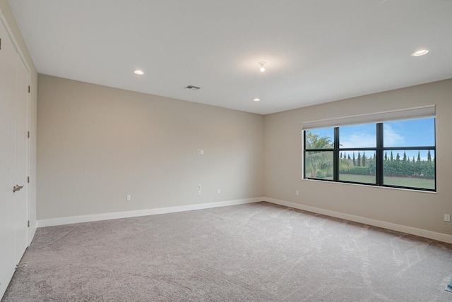 view of carpeted spare room