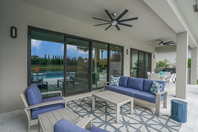 view of patio / terrace featuring an outdoor living space and ceiling fan