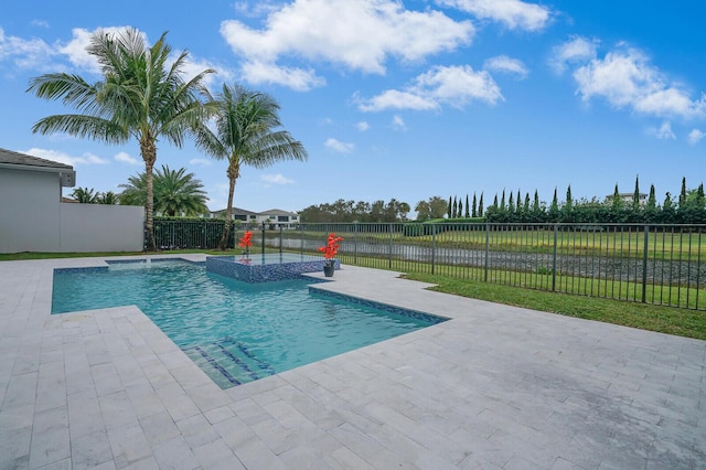 view of swimming pool featuring a patio