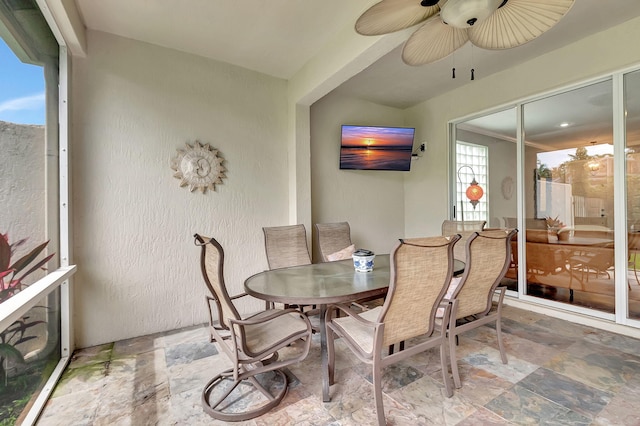 dining area with ceiling fan