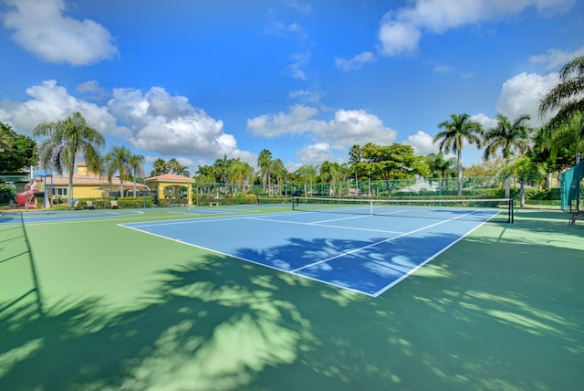 view of sport court featuring a gazebo and basketball court