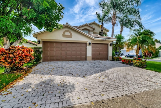 view of property featuring a garage