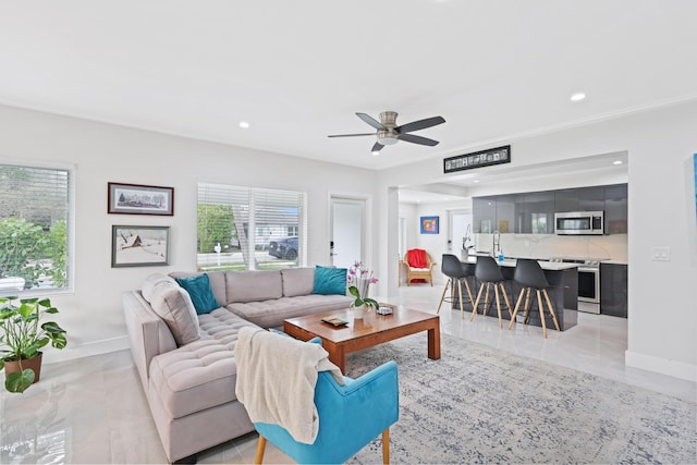 living room featuring ceiling fan