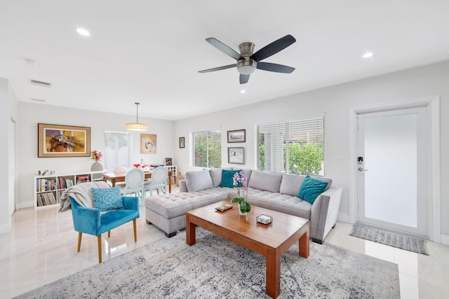 living room with ceiling fan