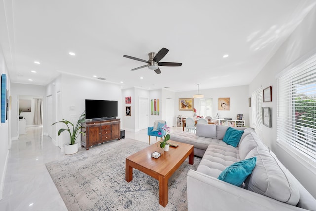 living room with ceiling fan