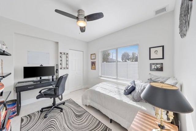 carpeted bedroom with ceiling fan