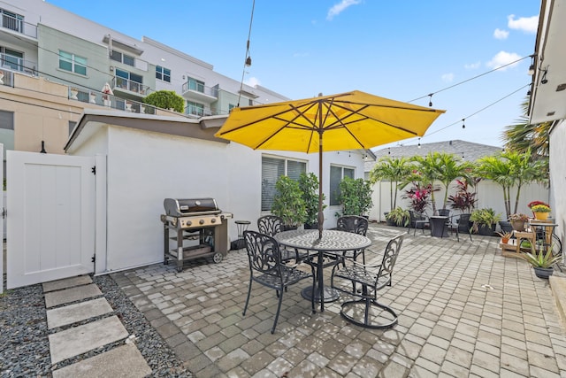 view of patio featuring a grill