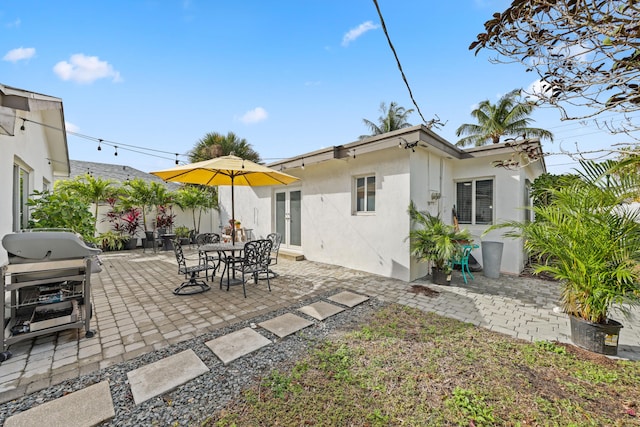 rear view of house featuring a patio area