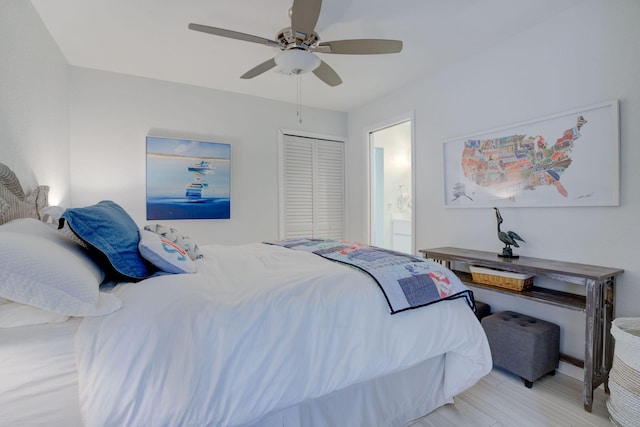 bedroom with ceiling fan, connected bathroom, and a closet