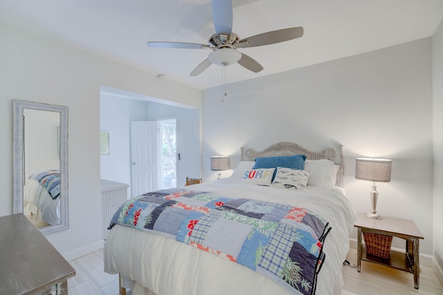 bedroom featuring ceiling fan and light hardwood / wood-style floors