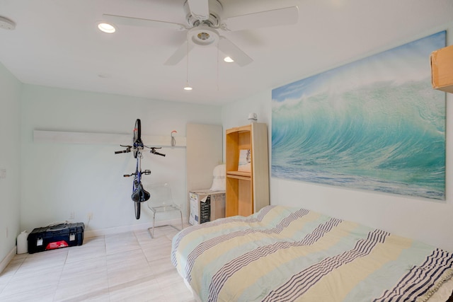 bedroom with ceiling fan and light tile patterned flooring