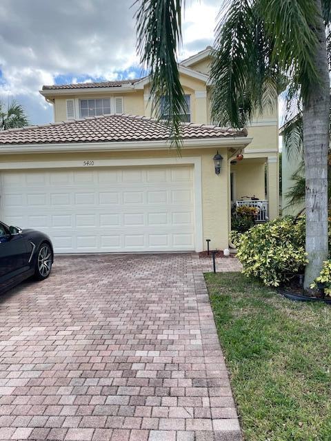 view of front of home with a garage