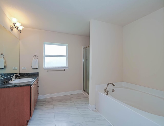 bathroom featuring shower with separate bathtub and vanity