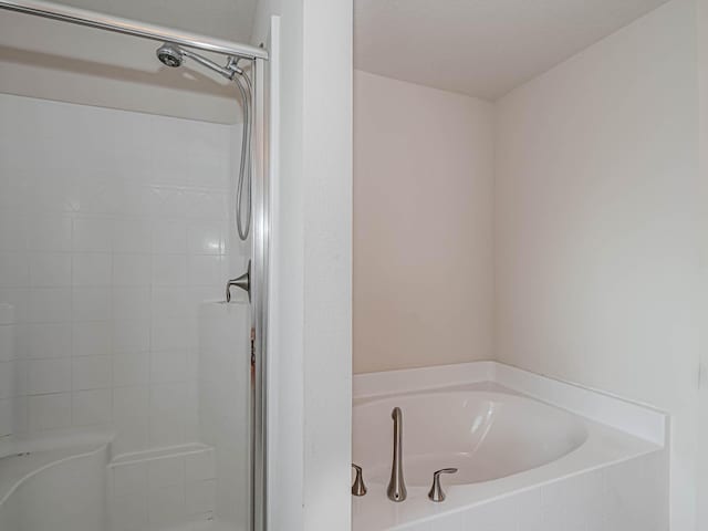 bathroom with plus walk in shower