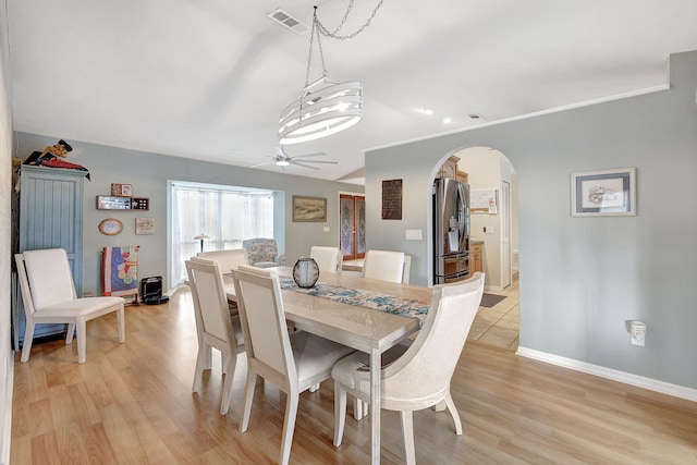 dining area featuring ceiling fan and light hardwood / wood-style flooring