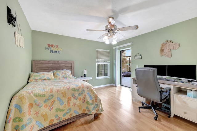 bedroom with access to exterior, light hardwood / wood-style floors, and ceiling fan