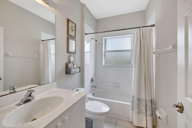 full bathroom featuring toilet, shower / bath combo, vanity, and tile patterned floors