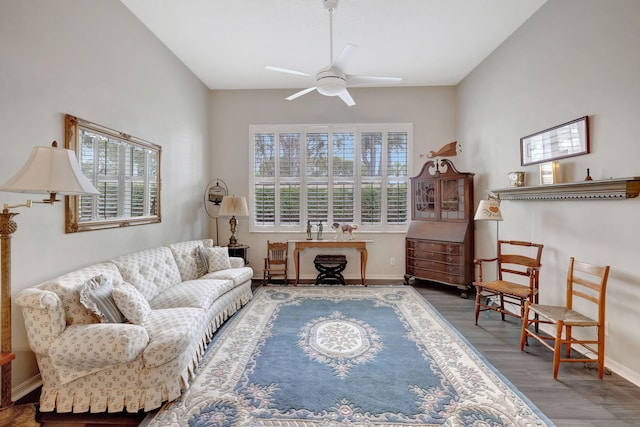 sitting room featuring plenty of natural light, ceiling fan, and wood-type flooring