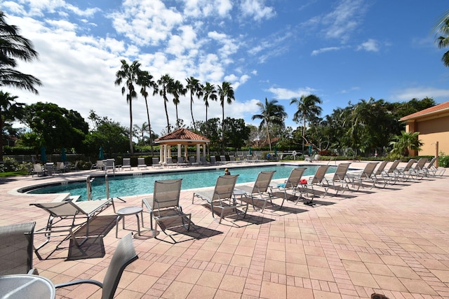 view of swimming pool featuring a gazebo and a patio